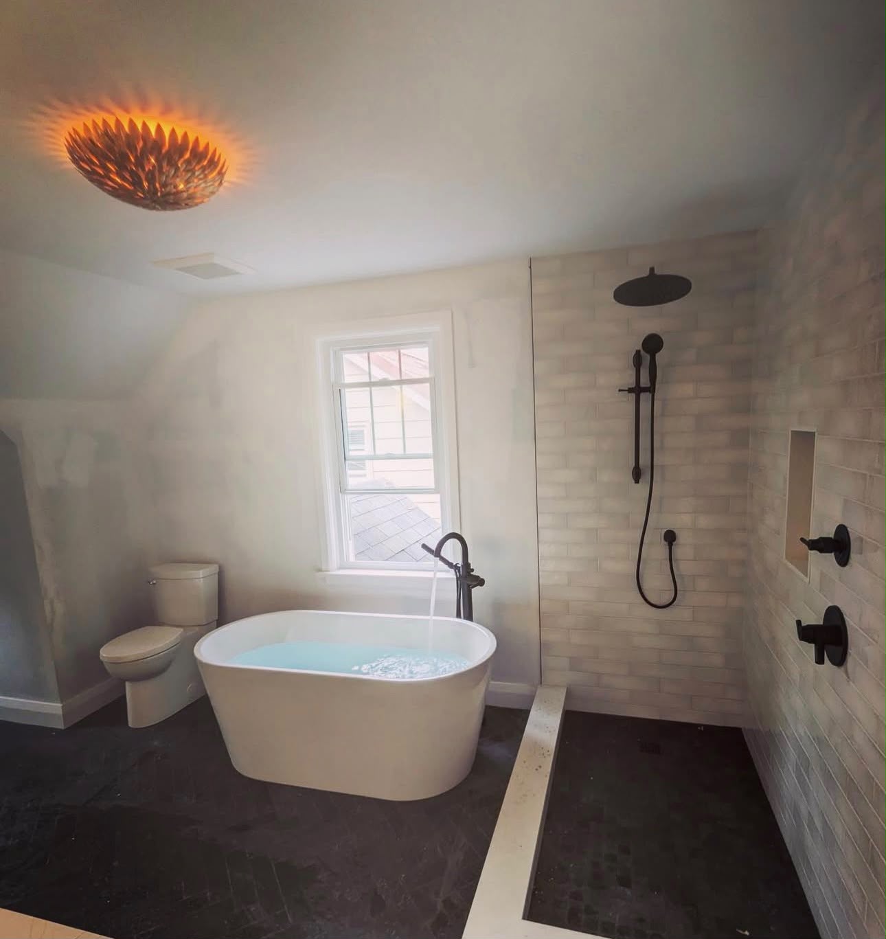 Luxury bathroom with soaker tub and tiled shower installed in Richmond Hill